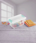 Sixteen Pack Clip Boxes Stackable Clear Plastic Storage Bins With Latching Lids containing craft supplies on a tabletop.