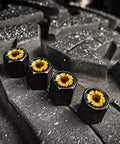 Aluminum Tire Valve Stem Caps 4 Pack with Dope Sunflower Pattern on a tire, showing corrosion resistant all weather metal caps.