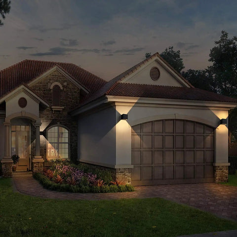 Four Pack Modern LED Wall Sconces Waterproof IP65 Outdoor Aluminum Up And Down Lights illuminating house facade at dusk