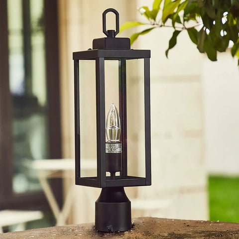 Rugged Outdoor Post Light With E26 Socket Waterproof And Anti Rust Build in modern matte black on a stone patio.