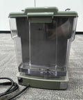 Top Shelf Green Espresso Machine With Integrated Burr Grinder And 15 Bar Pressure Pump clear water tank with lid and power cord.