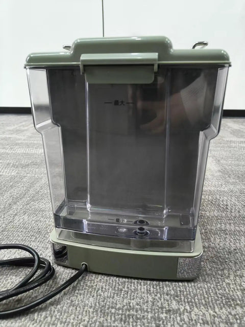 Top Shelf Green Espresso Machine With Integrated Burr Grinder And 15 Bar Pressure Pump clear water tank with lid and power cord.
