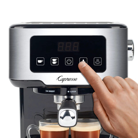 No Drama Home Bar Setup With This Compact Touchscreen Espresso Machine showing user interacting with touchscreen controls.