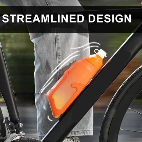 Aerodynamic Cycling Water Bottle 680ml Squeeze Flask built for stompin pavement in orange, secured in bike frame holder.