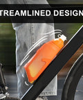 Easy Squeeze Cycling Water Bottle 680 ML Lightweight Bike Hydration Flask in orange mounted on a bike frame.