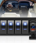 4 Gang IP68 Waterproof Rocker Switch Panel For Boats And RVs With DC 12-24V LED Digital Voltmeter And Dual USB QC 3.0 Type C Fast Charging Prewired Toggle Panel For Cars Marine Trucks Blue installed in a boat cabin