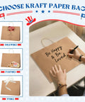 Person writing on Bulk 400 Pack 16x6x12 Inch Kraft Paper Bags With Handles Reusable For Biz Grocery Birthday Wedding Kids Party And Favors Eco Friendly Recyclable Shopping Bags, showing bag versatility for drawing, pasting, and tying.