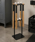 Heavy Duty Baseball Bat Stand With Badass Iron Frame Hella Tough Sports Equipment Rack For Game Room Gear Organizer And Electroplated Bat Display Holder Easy Setup with bats and baseballs.
