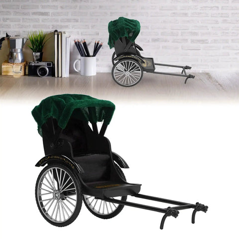 Retro Alloy Rickshaw Model Miniature Decor Showcasing Legit Vintage Charm And Dope Zinc Construction Perfect For Adding Cool Shelf Appeal Or Making A Solid Nostalgic Display Accent In Black on a desk with stationery.