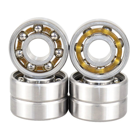 Two 608 open deep groove ball bearings with nylon cages, 8x22x7 mm, front view.