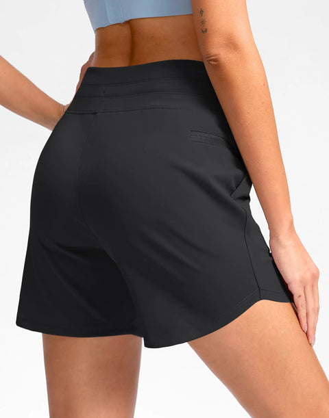 Back view of Women's 5 Inch Athletic Running Shorts With Quick-Dry Stretch, High Waist, 3 Pockets (Two Front, One Zip) in black.