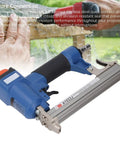 Professional Pneumatic Brad Nailer Built Knockout Tough For Woodworking Jobs holds 100 nails, shows quick connect air inlet detail.