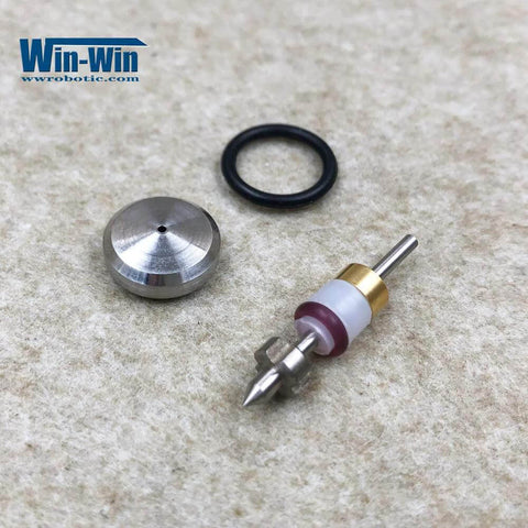 Waterjet on/off valve repair kit components: metal valve stem with brass collar, white plastic spacer, black O-ring, cap