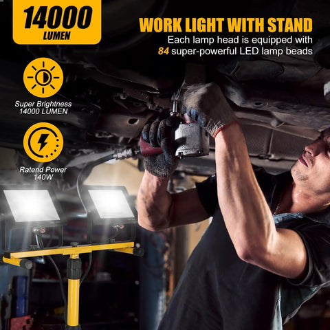 Super Bright 21000 Lumen LED Work Lights On Stand With Two Heads Portable Tripod Work Light For Outdoor And Indoor Job Sites IP66 Waterproof Heavy Duty Garage Workshop Construction Site Lighting in use under a car.