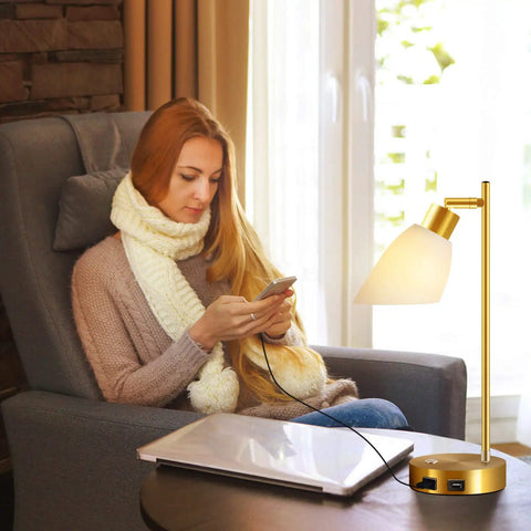 Woman using phone beside Gold Brass Industrial Table Lamp With Dual USB Ports Fully Dimmable Touch Control Edison Bedside Light