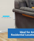 Slick Low Profile Flat Face Outlet Extender With Three Receptacles And Three Foot Power Cord Ultra Thin Build shown near sofa.
