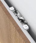Close-up of Slick Concealed Barn Door Hardware Kit with Soft Close Mechanism for Hidden Ghost Sliding Door System on aluminum track.