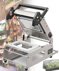 Top Tier Stainless Steel Tray Heat Sealer For Commercial Kitchens And Takeout Orders semi automatic design with open lid.
