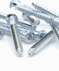 Close-up of M5 x 50mm Confirmat Screws for furniture assembly, zinc-plated wood fasteners for flat-pack shelves and cabinets