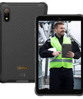 Hardcore 8 Inch Rugged Tablet Packed With Octa Core Processor And 16GB RAM And 128GB Storage Featuring 48MP Camera System And Massive 7650mAh Battery in use by worker in safety gear.