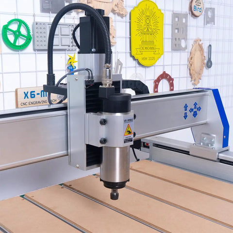 Close-up of Shop Ready Heavy Duty 4 Axis 9090 CNC Router For Wood Engraving Milling with spindle and cutting table.