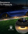 Car driving over Solar Deck Lights Outdoor Waterproof LED 4 Pack Warm White Dock Lights With Big Solar Panel Solar Powered Lights