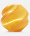 Close-up of gold PLA Silk Plus 1.75mm 1kg filament spool for 3D printing, showing smooth finish and low warp compatible with FDM printers.