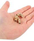 Hand holding 9 Piece Grease Fitting Kit With Copper Nozzle Caps For Cars And Trailers, showcasing straight and angled nipples.