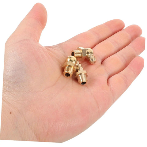 Hand holding 9 Piece Grease Fitting Kit With Copper Nozzle Caps For Cars And Trailers, showcasing straight and angled nipples.