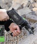 Beast Corded Hammer Drill With 4.5 Amp Motor 0 To 3000 RPM 1/2 Inch Keyed Metal Chuck in use on concrete with bit set shown