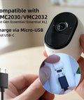 Close-up of Arlo Essential XL camera with Micro USB charging cable connection for 3.2W Solar Panel For Security Cameras Compatible With Arlo Essential XL Waterproof Charger With 13Ft Cable And 360 Degree Adjustable Mount Micro USB And USB C For 5V Rechargeable Cameras.