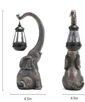 Outdoor Solar Powered Elephant Garden Statue With LED Lantern Lights, waterproof resin, 15 inch tall, cute trunk detail