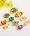 Top Shelf Sand Gold Inlay Stone DIY Jewelry Beads Featuring Braided Rope Accents And Durable Baking Lacquer Coating For Fly Bracelets Necklaces And Badass Pendant Spacers Pack Of 10 assorted multi-colored beads with gold accents on a flat surface.