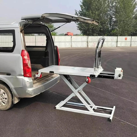 Professional Grade Heavy Duty Workhorse Electric Scissor Lift Table 660 Lb Capacity positioned at van's rear for easy loading.