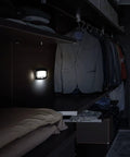 Motion Sensor Wireless Lights Two Pack Hands Free Wave Activated Touchless Dimming Wall Lights illuminating a walk-in closet