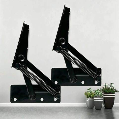 Heavy Lifter 90 Degree Bench Seat Hinge Pair Built Straight Up Tough For Toy Box Lid Support And Cabinet Doors Featuring Smooth Foldable Lifting Bracket Crafted From Cold Rolled Steel In Glossy Black shown on a wall.