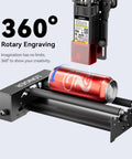 Pro Laser Rotary Roller For Round Etching With Dope 360 Auto Spin And Hella Wide 6 To 300 Millimeter Dial engraving a red can.
