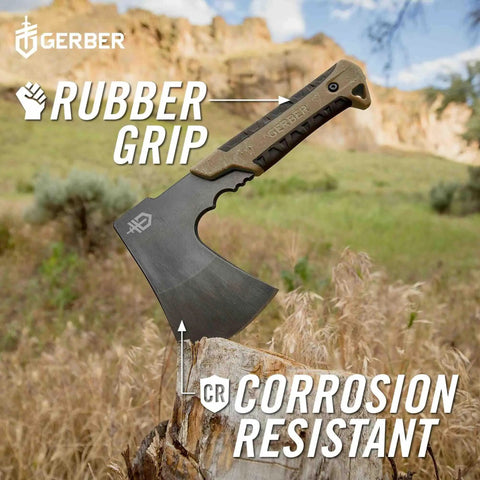 Compact Pack Hatchet With 3.5 Inch Steel Blade, Full Tang, Ergonomic Rubber Grip For Comfortable Chops shown outdoors.