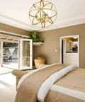 Killer Contemporary Four Light Wall Sconce In Fresh Heirloom Brass Finish With Sophisticated Metropolitan Details For Top Notch Room Accent Lighting And Totally Sweet Candelabra Bulb Mounting in an elegant bedroom.