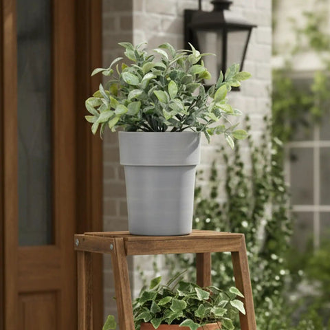 Stealth Mini Flower Pot Safe With Realistic Plant Deco And Key Lock Secret Stash Box for Cash Keys on wooden stand outdoors.