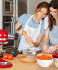 Two women using a Stainless Steel Slicer Shredder Attachment for KitchenAid Mixers Cheese Grater and Food Slicer Accessory