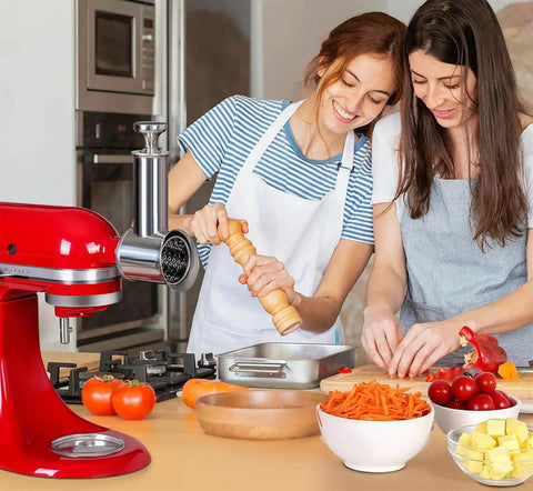 Two women using a Stainless Steel Slicer Shredder Attachment for KitchenAid Mixers Cheese Grater and Food Slicer Accessory