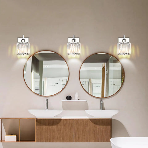 Image of a bathroom with two round mirrors and three Four Light Chrome Crystal Vanity Light Over Mirror For Bathroom fixtures.