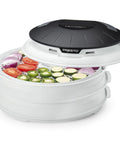 Electric Food Dehydrator With Four Stackable Trays And Top Mounted Fan perfect for drying fresh veggies like tomatoes, peppers, and zucchini.