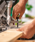 Using the Cordless Miter Saw Kit With 10-Inch Blade, 18V and 36V MultiVolt Battery And Charger for precise wood cutting.