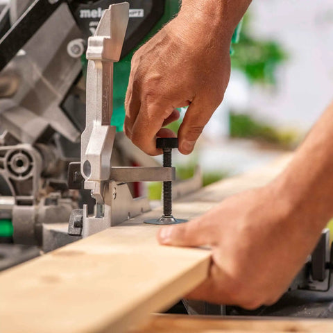 Using the Cordless Miter Saw Kit With 10-Inch Blade, 18V and 36V MultiVolt Battery And Charger for precise wood cutting.