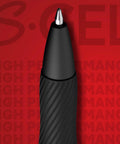 Close-up of the tip of Go-To Gel Pens With Pearl White Body And Black Ink 0.7mm Medium Point, 12 Count For Journaling Writing Note Taking School And Office Supplies, Smoother Cleaner Quicker Drying No Smear, Modern Professional Look against red background.