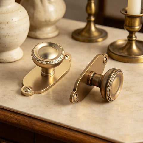 Top Notch Heavy Duty Solid Zinc Cabinet Knobs With Vintage Oval Beaded Back Plates Antique Brass Finish six pack on countertop.