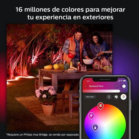 Hue White And Color Ambiance Outdoor LightStrip 2m 7ft illuminating a patio with vibrant colors controlled by a smartphone app.