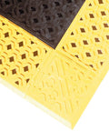 Cushion-Lok Perforated Series Drainage Mat 30 By 48 Inches Black Yellow Safety Anti Fatigue Mat corner detail with drainage holes